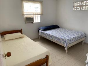 Cama o camas de una habitación en "Casa Viña Del Mar" Playa Blanca