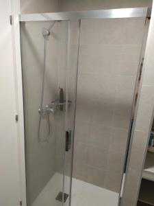 Ένα μπάνιο στο Luminoso Apartamento en Primera Línea de Playa