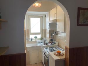 A kitchen or kitchenette at Casa Jolanda