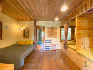 Postel nebo postele na pokoji v ubytování Ziczac Homestay Đà Lạt