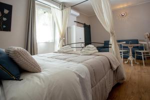 Postel nebo postele na pokoji v ubytování L'Accademia dei Sogni