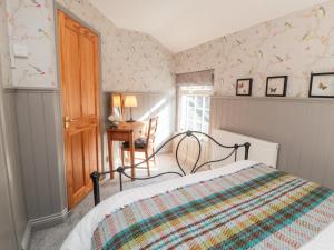 Voodi või voodid majutusasutuse Esk View Cottage toas