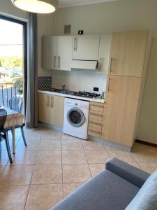 A kitchen or kitchenette at Molino Apartments