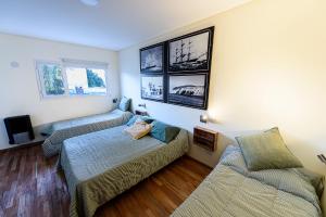 TV a/nebo společenská místnost v ubytování La Tosca Hostel