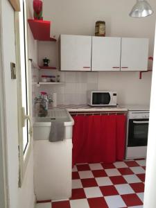 A kitchen or kitchenette at Al Baglio low cost