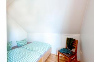 Postel nebo postele na pokoji v ubytování Auszeit auf Rügen