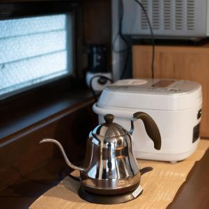 a tea kettle sitting on a counter next to a toaster at Tsugumian in Kanazawa