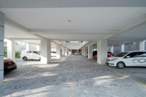 a large parking lot with cars parked in it at D'Paragon Manduro in Solo