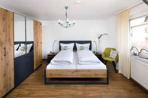 Llit o llits en una habitació de Ferienhaus Schlamminger