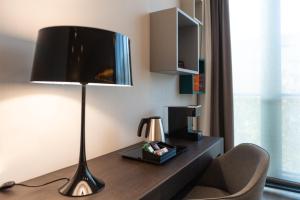 TV a/nebo společenská místnost v ubytování DUPARC Contemporary Suites