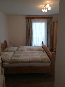 Postel nebo postele na pokoji v ubytování Haus Elisabeth