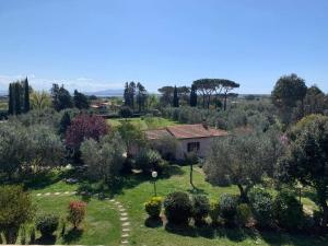 an aerial view of a garden with a house at Casa Maremma in Castiglione della Pescaia