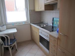 Кухня или кухненски бокс в Appartement-Konsulweg-KON-375