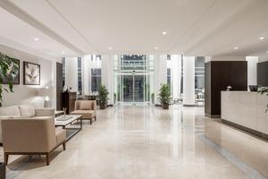 Posezení v ubytování Landmark Hotel & Suites فندق وأجنحة لاندمارك