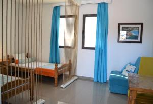 Ένα ή περισσότερα κρεβάτια σε δωμάτιο στο Yeshill Apart & Studio