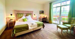 Voodi või voodid majutusasutuse Hotel Sonnenhof Aspach toas