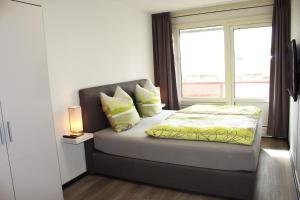 Postel nebo postele na pokoji v ubytování Appartement Amelanderoase 83 im Amelander Paradijs