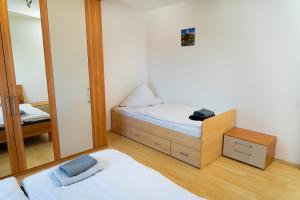 Ein Bett oder Betten in einem Zimmer der Unterkunft 153 m² Haus mit 6 Schlafzimmern für 12 Persoen