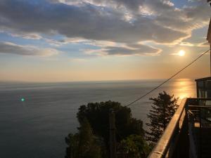 a view of the ocean from a balcony at Luna Convento Copanello B&B in Stalettì
