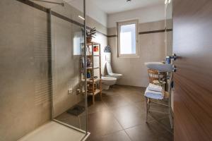 Een badkamer bij Villa Luthien