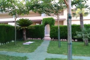 a building with a large number in the yard at apartamento moderno in Benidorm