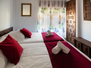 Postel nebo postele na pokoji v ubytování Casa Rural del Juez