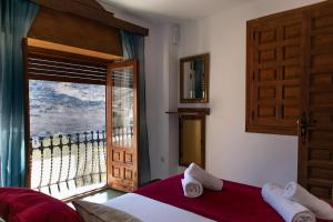 Posteľ alebo postele v izbe v ubytovaní Casa Rural del Juez