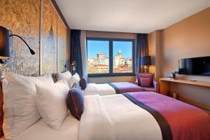 Postel nebo postele na pokoji v ubytování The Halich Hotel Istanbul Karakoy - Special Category
