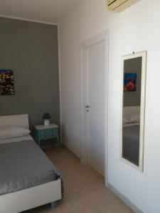 Postel nebo postele na pokoji v ubytování villa lucia