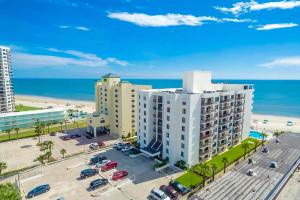 an aerial view of a building and the beach at Daytona Beach Soaring in Daytona Beach Shores
