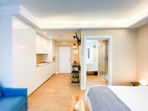 Ένα ή περισσότερα κρεβάτια σε δωμάτιο στο Apartamentos Kai