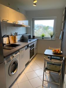 Kjøkken eller kjøkkenkrok på Moderne Wohnung in stadtnaher, dennoch ruhiger Lage