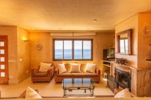 a living room with a couch and a table at Port Andratx - 3444-29 Mallorca in Port d'Andratx