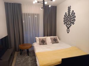 Posteľ alebo postele v izbe v ubytovaní Apartament - Kluszkowce nad Jeziorem Czorsztyńskim