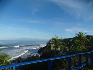a view of the ocean from a bluff at The Hill B&B (El Morro Hosteria) in El Valle