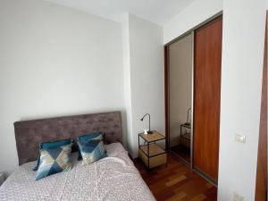 Postel nebo postele na pokoji v ubytování Antresola apartament Zeta Park
