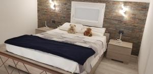 Postel nebo postele na pokoji v ubytování LA EX DI NICHOLAS