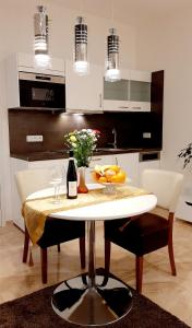 Kuchyňa alebo kuchynka v ubytovaní Nobless Apartments Holedná Brno