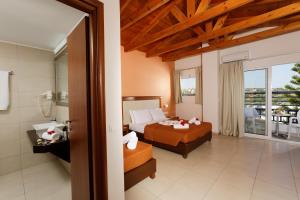 Posteľ alebo postele v izbe v ubytovaní Agrabella Hotel - Adults Only