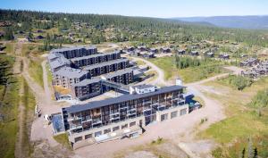 an aerial view of a building in the mountains at Skistar Lodge Trysil in Trysil