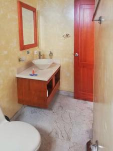 Ванная комната в Hotel Rio Humadea