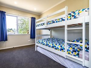Katil dua tingkat atau katil-katil dua tingkat dalam bilik di Bluebird Day - National Park Holiday Home