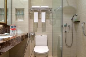 Koupelna v ubytování Hotel Santika Bandung