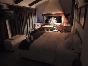 Postel nebo postele na pokoji v ubytování GM Rooms Boutique Hotel