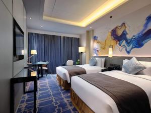 Postel nebo postele na pokoji v ubytování Primus Hotel Shanghai Sanjiagang - Offer Pudong International Airport and Disney shuttle
