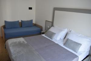 Postel nebo postele na pokoji v ubytování Hotel Edelweiss