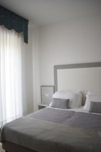 Postel nebo postele na pokoji v ubytování Hotel Edelweiss
