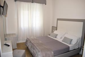 Postel nebo postele na pokoji v ubytování Hotel Edelweiss