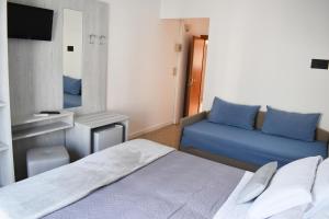 Postel nebo postele na pokoji v ubytování Hotel Edelweiss