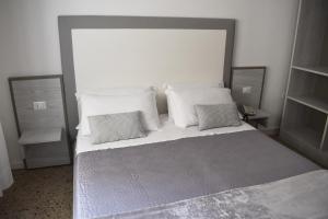 Postel nebo postele na pokoji v ubytování Hotel Edelweiss